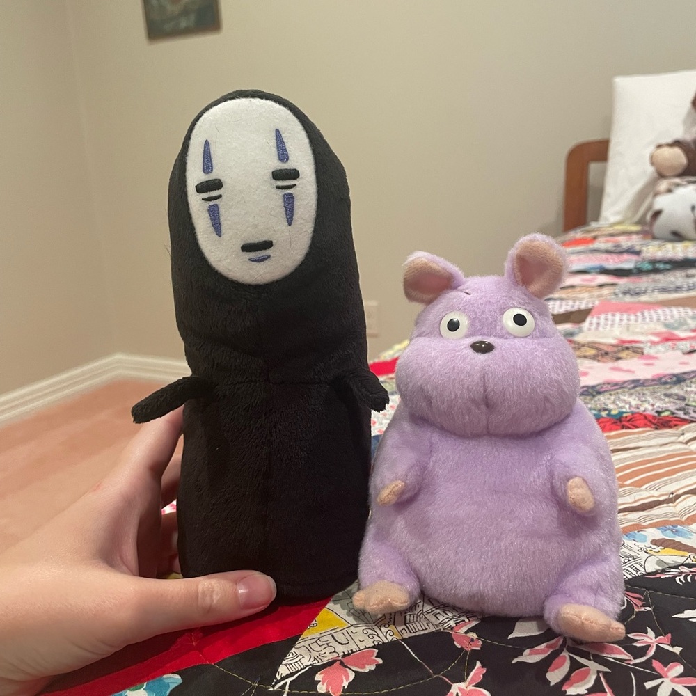 Black and Purple Stuffed Animal Duo